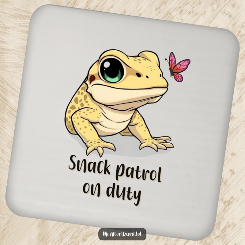 Funny coaster with a monitor lizard attempting to catch a butterfly, offering humorous surface protection.