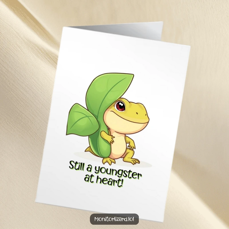 Funny Free Printable Birthday Card featuring a smiling monitor lizard playfully peeking from behind a lush green plant.