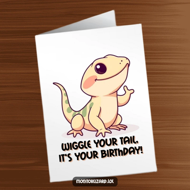 Funny Free Printable Birthday Card: A playful monitor lizard performing a cute tail wiggle, expressing pure birthday joy and excitement.