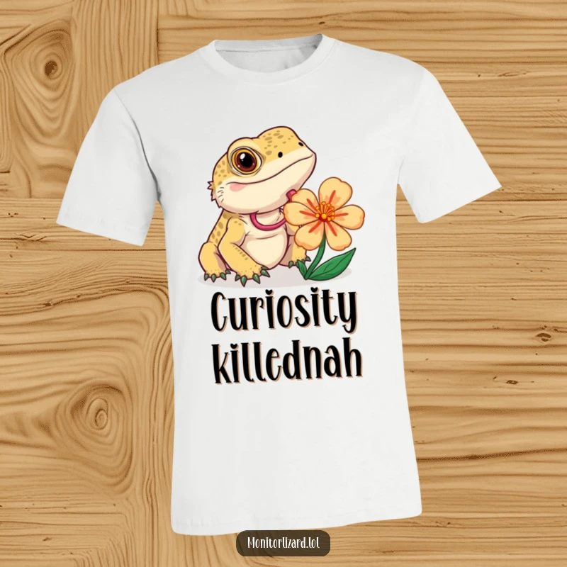 Funny monitor lizard t-shirt featuring a curious lizard flicking its tongue to examine a vibrant, colorful flower.
