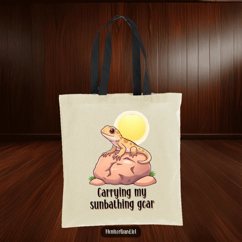 Funny tote bag showcasing a content monitor lizard basking peacefully on a sunny rock, ideal for humorous, eco-friendly carrying.